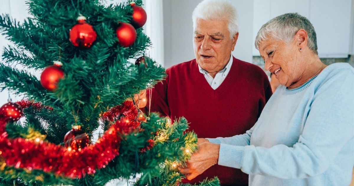 Decorating is a safe and fun way to include seniors in the holidays.