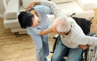 caregiver-and-elderly-talking=about-home-care